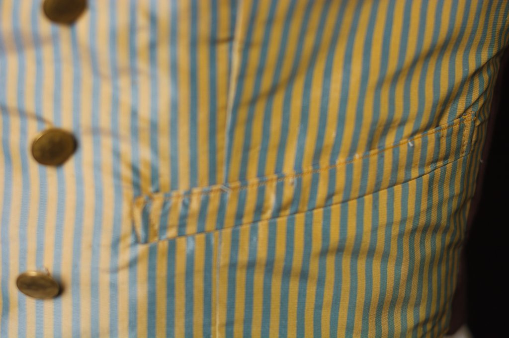 Waistcoat pocket in striped silk.