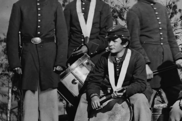 Civil War Musicians and Drummer Boy in dress uniform.