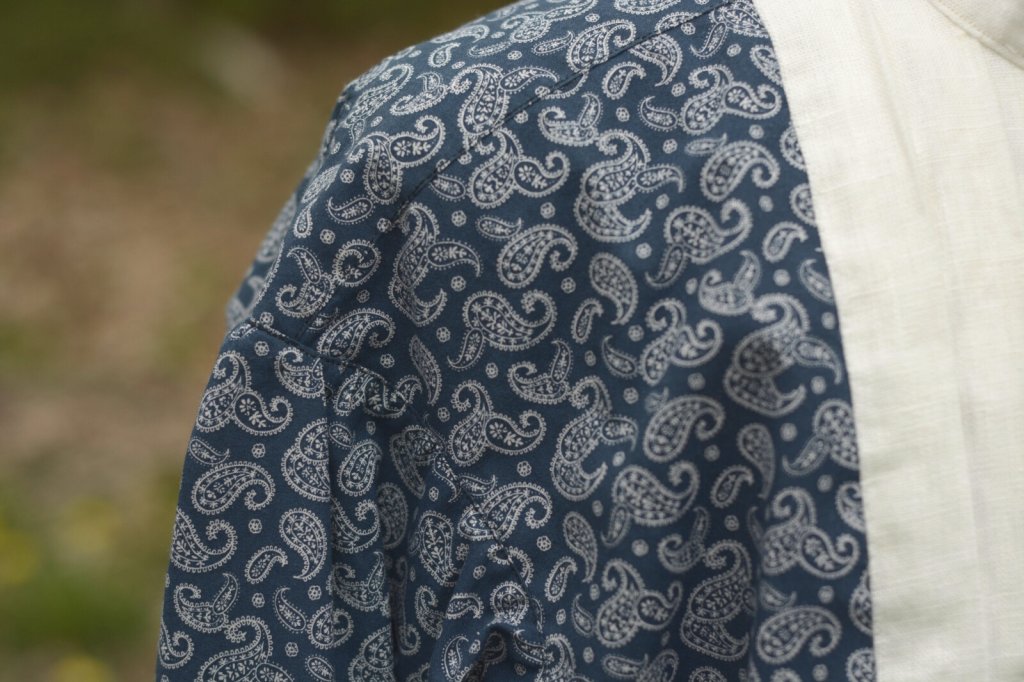 The shoulder area of the shirt.