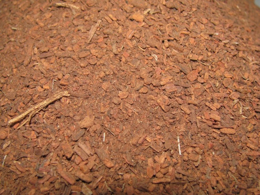 A closeup photo of ground madder root.