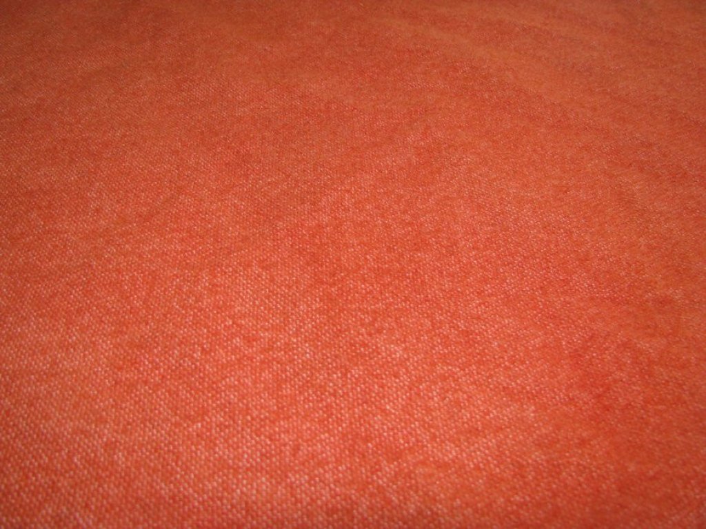 Orange-red madder root dyed fabric.