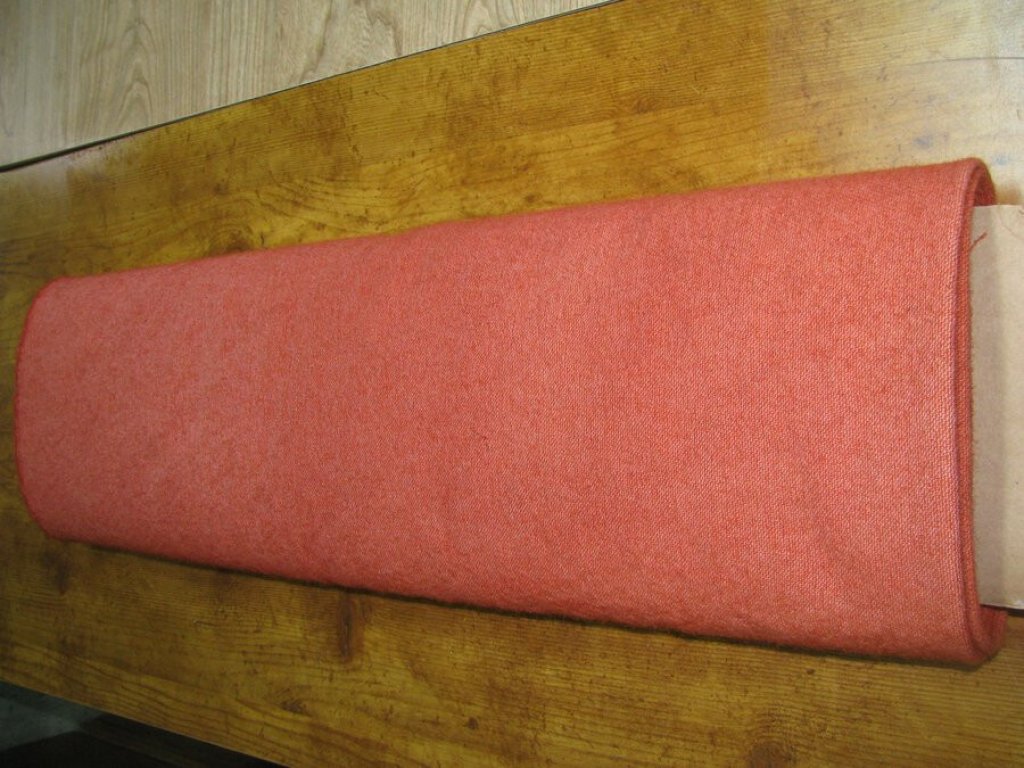 Roll of red fabric dyed with madder root.