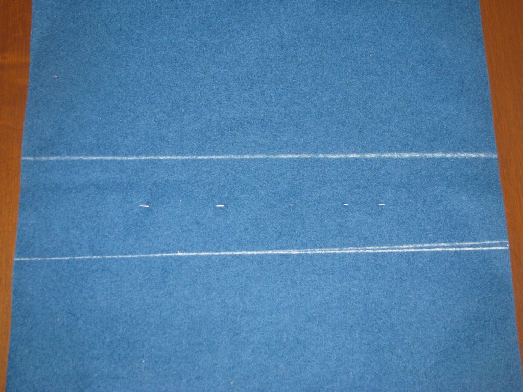 Mark lines above and below the pocket.