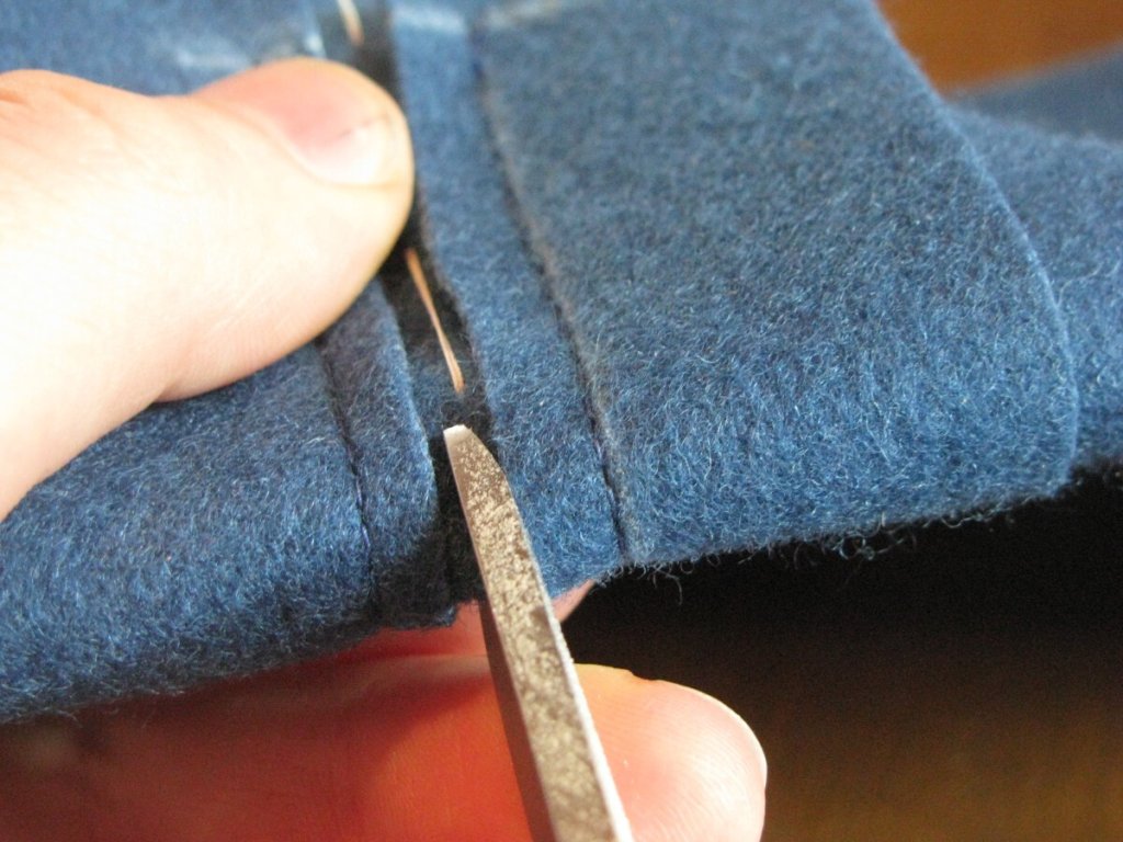 Make a small cut in the center of the pocket.