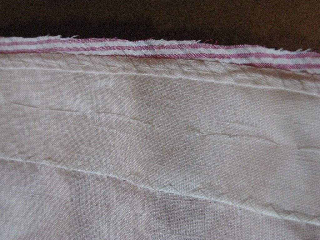 Stay tape and linen are added to strengthen the front.