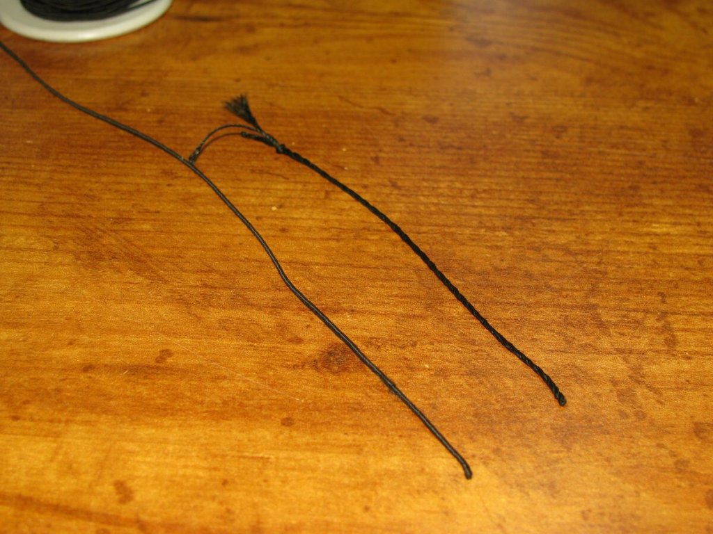 Buttonhole gimp and four cord after waxing and pressing.