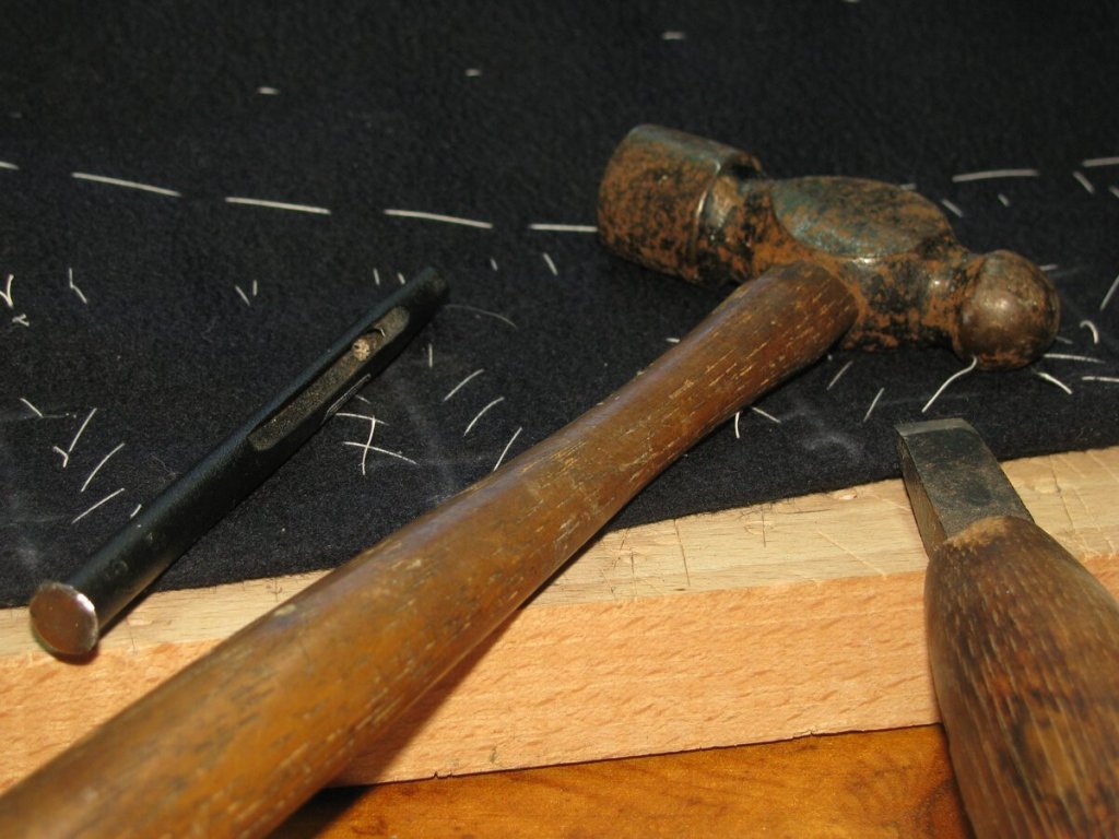 Tools used for cutting open the buttonholes.